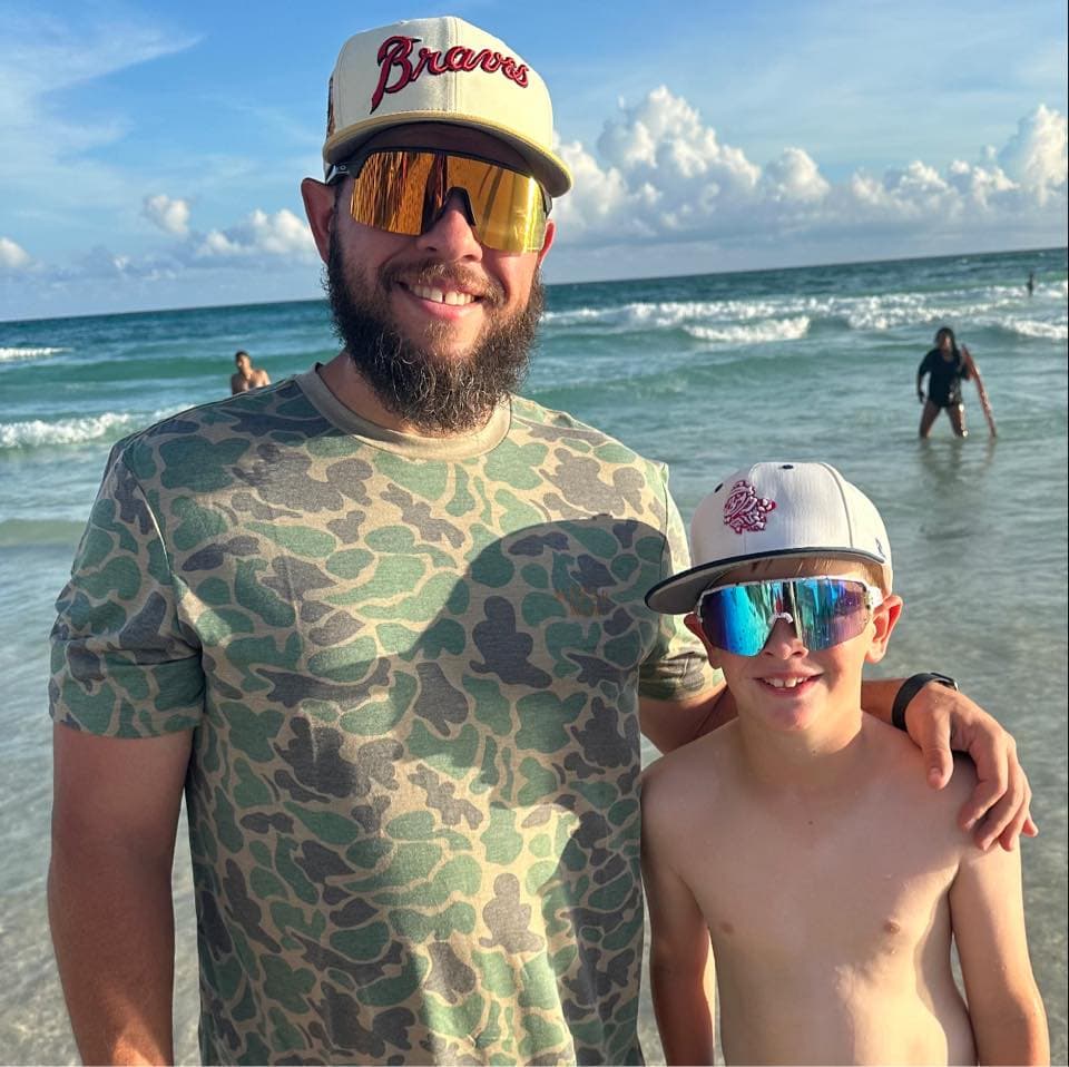 Drew working on a baseball glove at The Glove Yard workshop