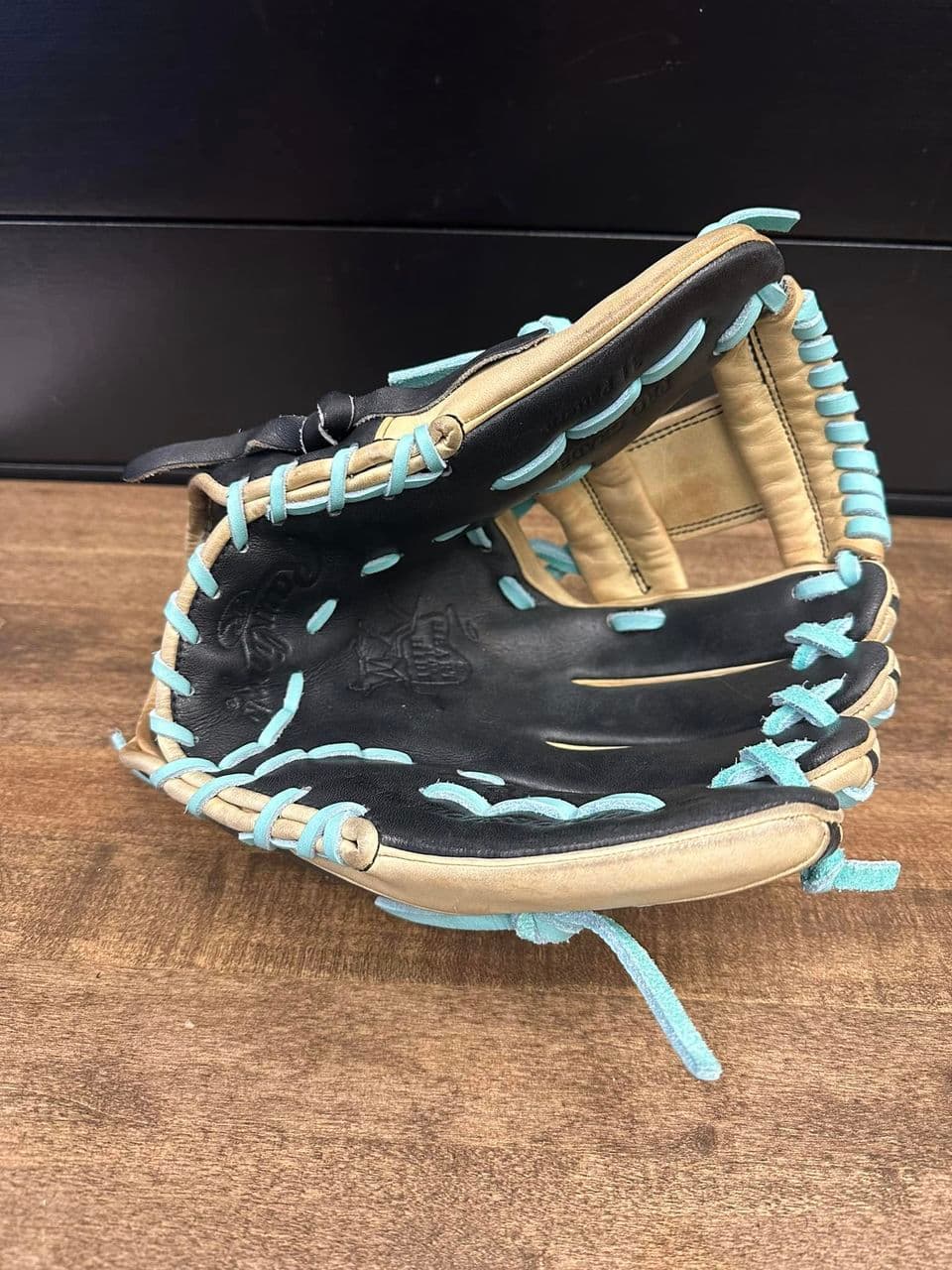 Relaced infielder glove with new lacing